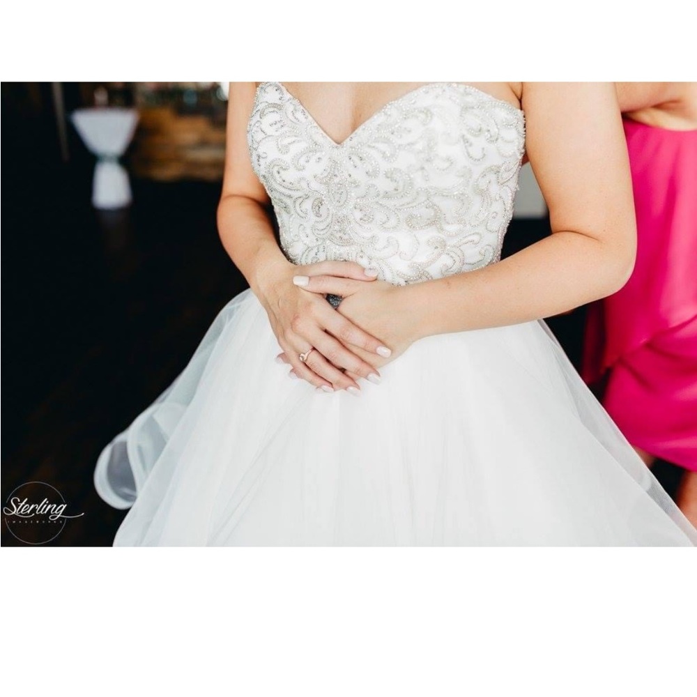 The Dress + Veil 
Princess ball gown wedding dress with sweetheart bodice.